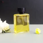 China Custom Flat Perfume Bottle 100ml with Zamac Cap